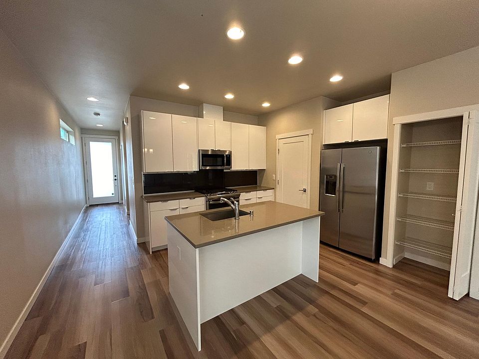 The kitchen door goes into the 1 car garage