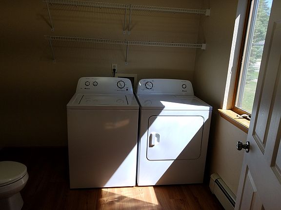 Washer and dryer in half bath on first floor.