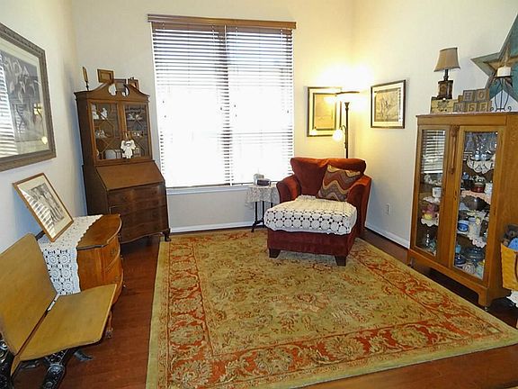 Located off the foyer is the formal dining room (presently being used as a formal living). It is 11x11 and has wood flooring.  Beautiful room!  It has room for not only a dining table, but ample wall space for a China hutch and serving buffet.