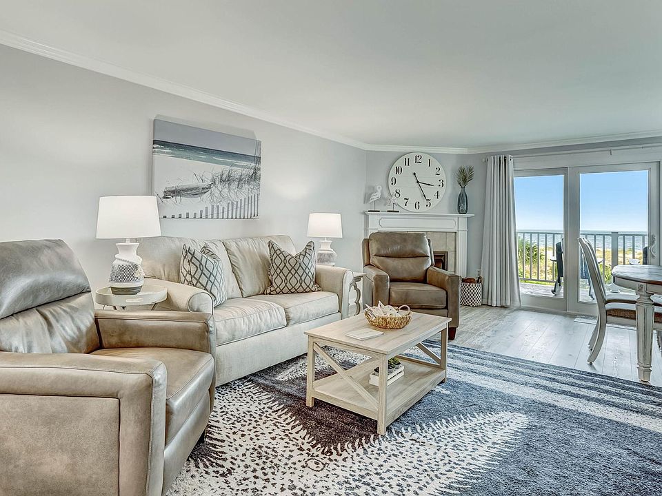 Living room with plenty of seating in front of the TV. Brand new furnishings including 2 recliners.