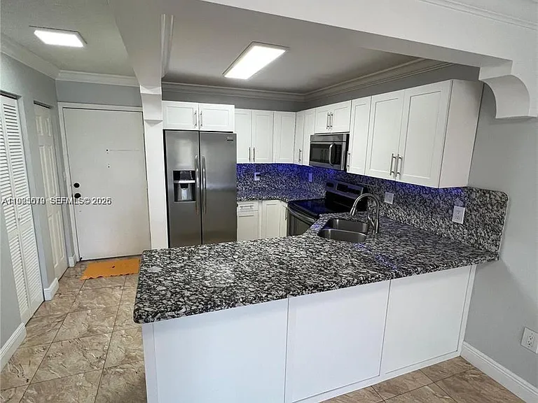 1075 W 68th St #218 — Photo 10