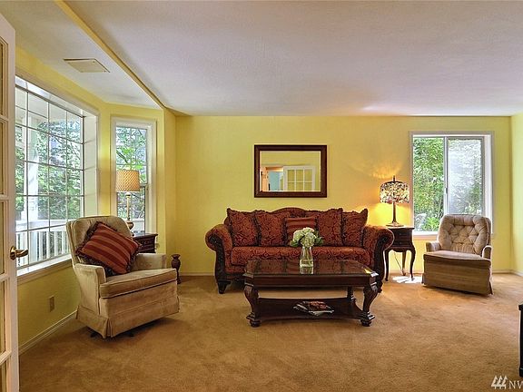 Double glass French doors just off the foyer into the formal front room.  