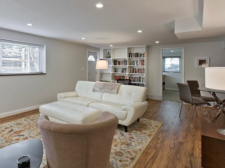 View from far end of living room toward entrance