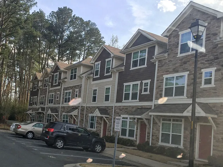 Exterior - freshly painted & parking lot recently paved. 3 assigned parking spots