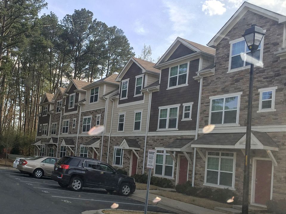 Exterior - freshly painted & parking lot recently paved. 3 assigned parking spots
