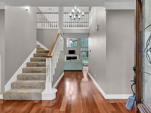 Come in! Brazilian cherry floors, loads of natural light, neutral colors and flowing floor plan welcomes you home.