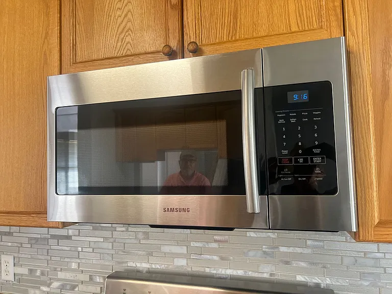 19 - Over-the-range microwave with built-in lighting and ventilation.