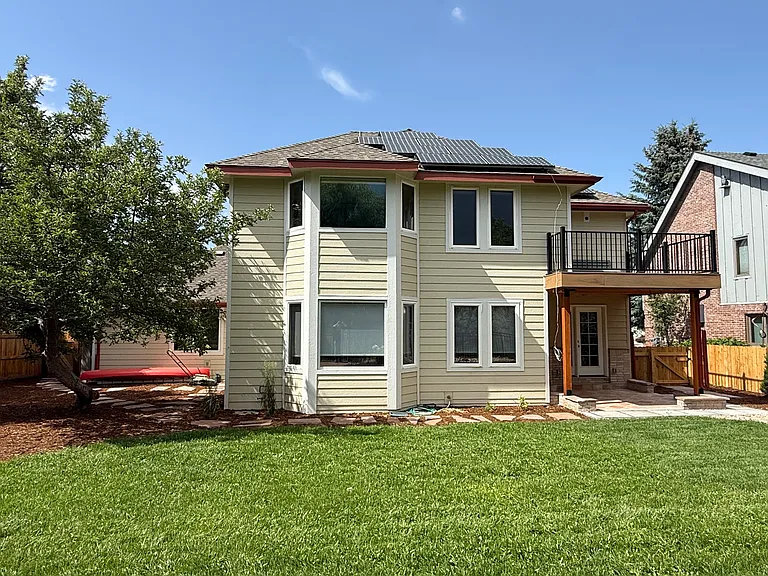 New upper and lower deck. House backs up to HOA natural area and creek