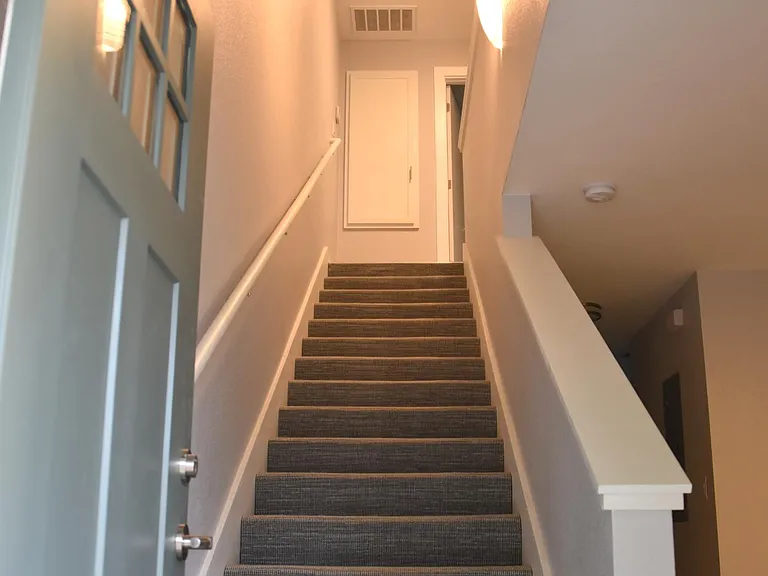 Staircase; at the top is a linen closet