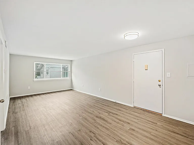 Experience the expansive charm of this modern living space, perfect for relaxation and entertainment.