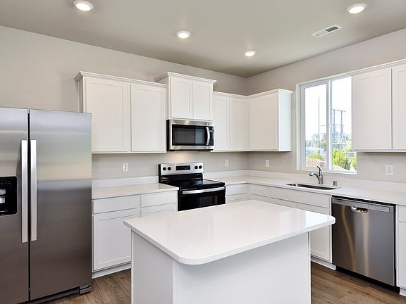Meal preparation is easy in your spacious, new kitchen.