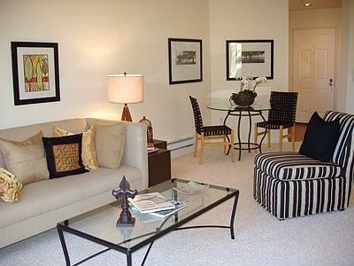 Living room flows to dining area