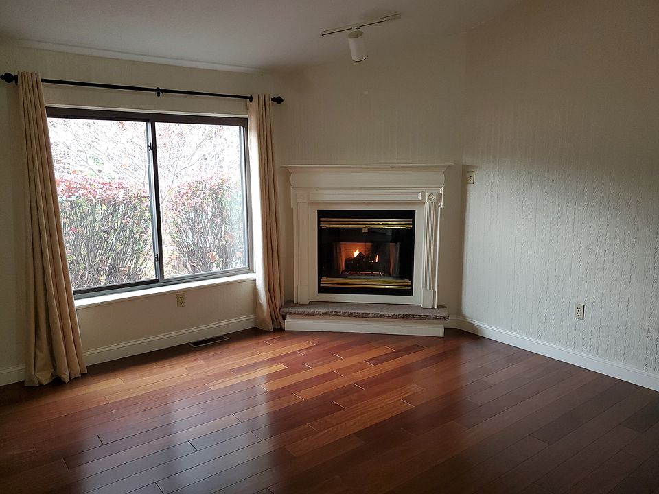 Living room with gas fireplace.