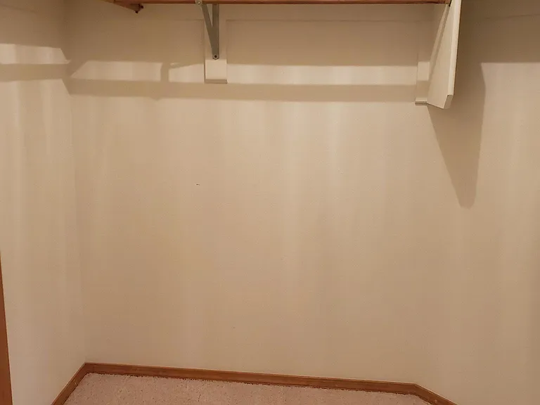 Walk-in closet in 2nd upstairs bedroom