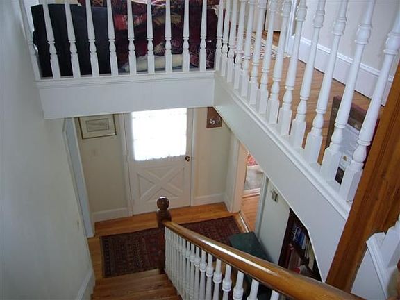 Entrance foyer, but also has front and back staircase