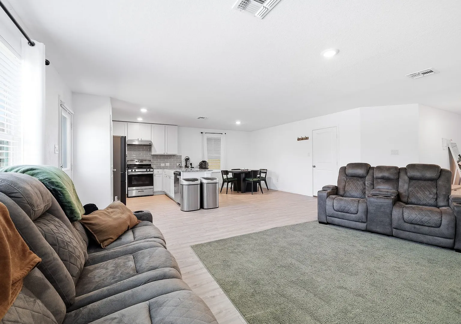 Open Concept Home with Loft & Two Patios — Photo 3