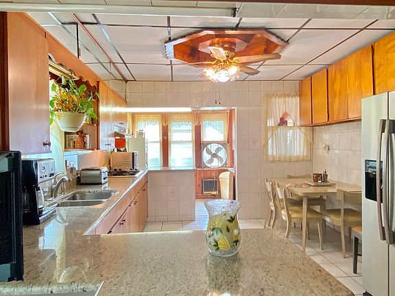 Lots of natural light loads of cabinets and counte