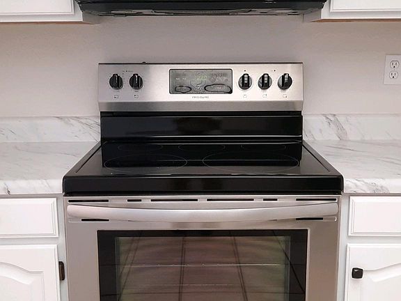 Brand new stainless stove/oven with self-clean feature.