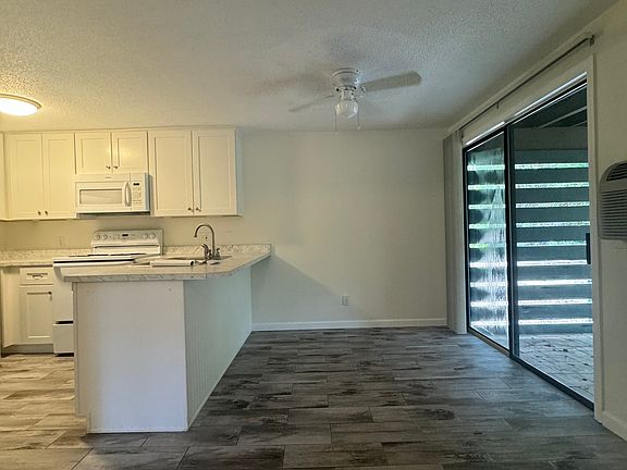 Kitchen, Breakfast Bar, and Dining Space