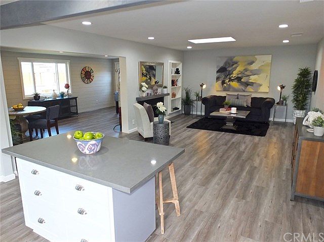 This is the view from the kitchen looking back towards the family room and enclosed patio. Hang your