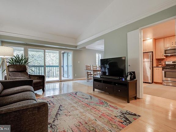 Living room that flows into dining room.
