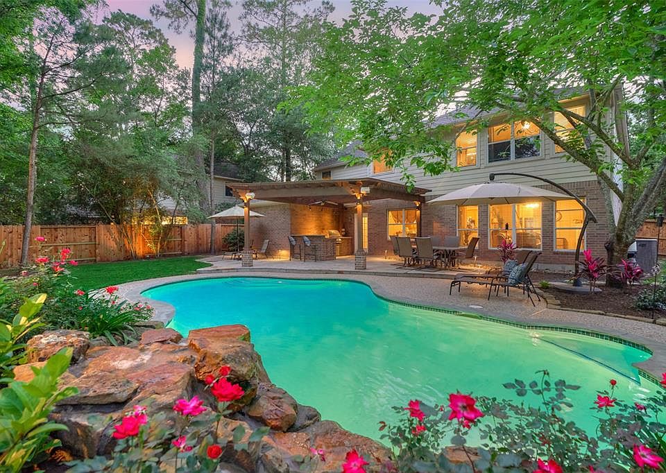 Beautifully Landscaped with a Backyard Oasis