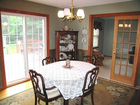 Formal dining room with sliding glass doors to the deck.
