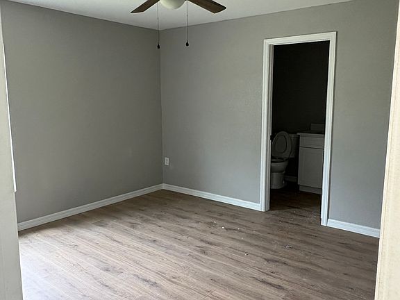 Bright, spacious master bedroom with a modern ensuite and large closet.