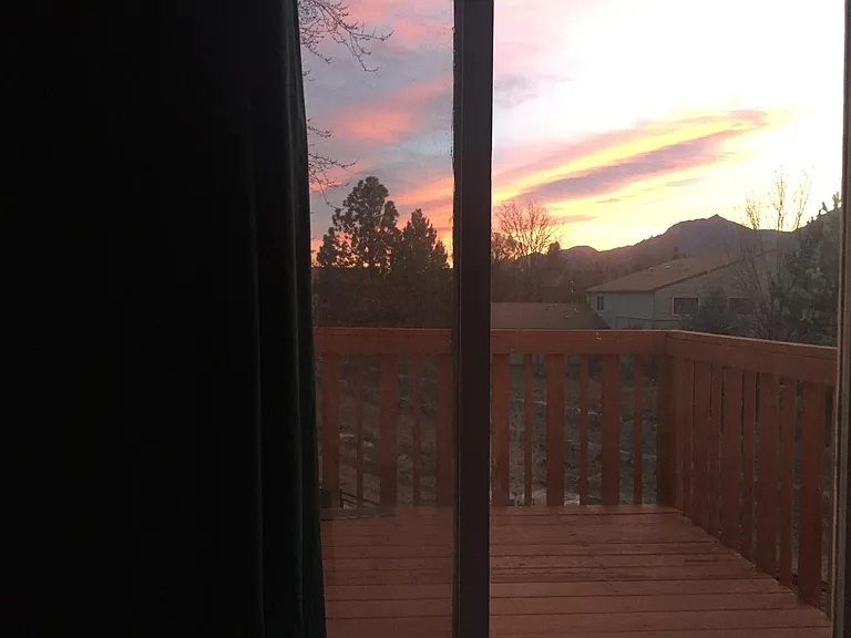 Sunset on the flatirons from upstairs bedroom