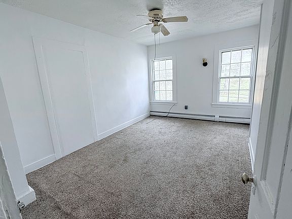 Bedroom 2 with Closet and Ceiling Fan
New windows and door (image does not show)