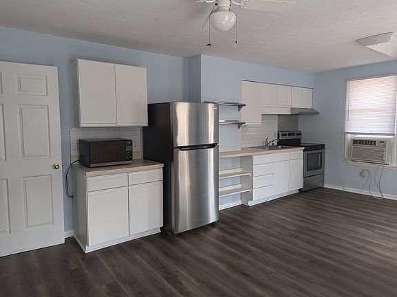 Kitchen with 4 appliances (dishwasher not shown in this picture.