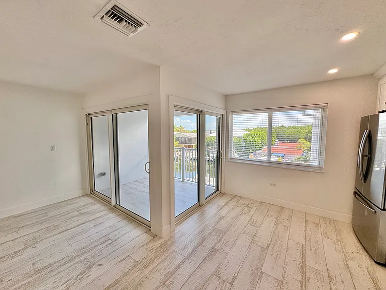 Double Impact Sliding Doors to Balcony