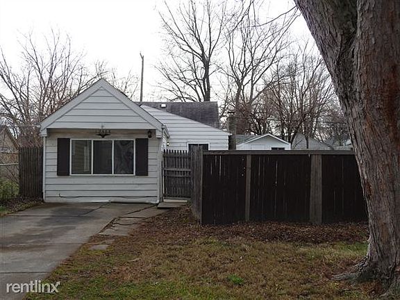 house and privacy fence