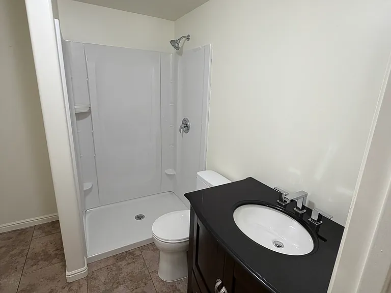 Bathroom near kitchen/dining area