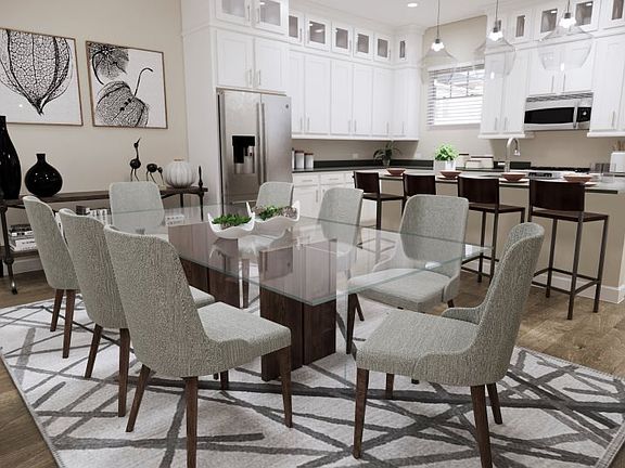 Situated among the main living areas on the second floor is the dining room, conveniently located in