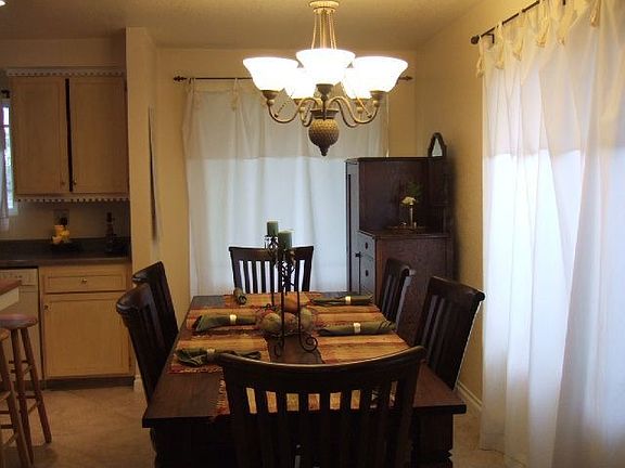 Spacious dining room with tile floors
