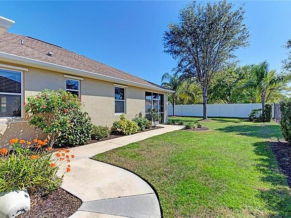 sidewalk for easy/clean access to the garage and lanai, and gutters throughout