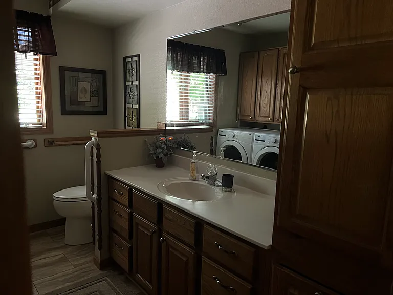 Hallway bath with bathtub/shower/washer/dryer