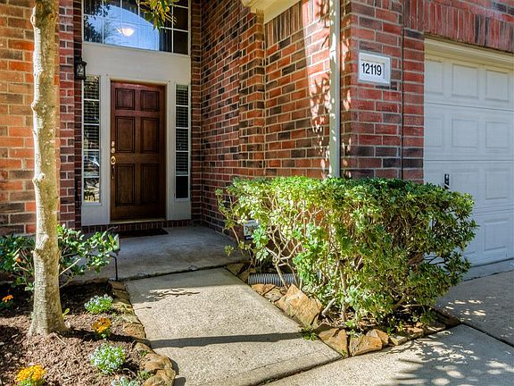 You'll welcome family and friends  through an inviting doorway