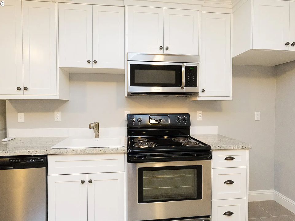 There IS a refrigerator! Just not featured in picture.