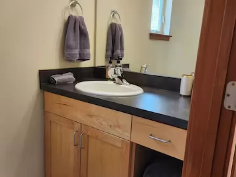 .5 bath attached to downstairs bedroom
