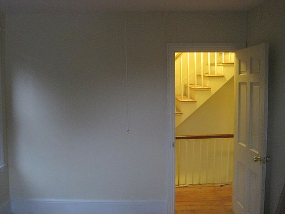 2nd bedroom view of hall & stairs to 3rd floor