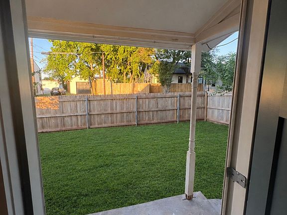 View from the front door of the fenced yard.
