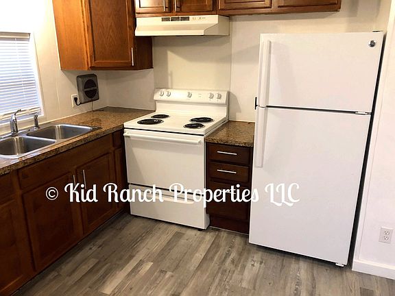 Open Kitchen With Electric Range & Refrigerator Included...