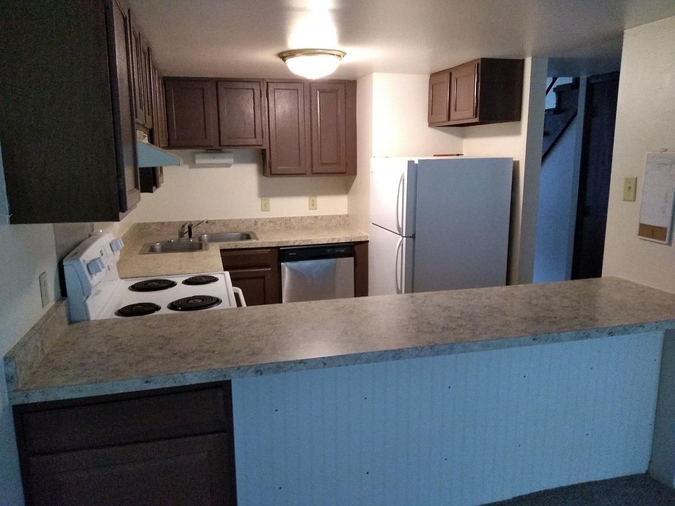 Kitchen with breakfast bar - view from Family Room