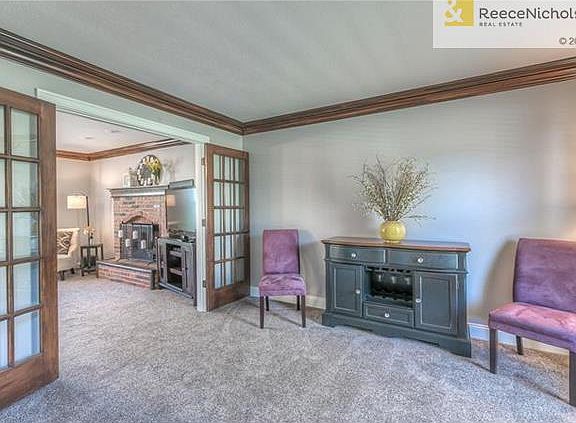 The front living room has library doors and could be used as a first floor office.