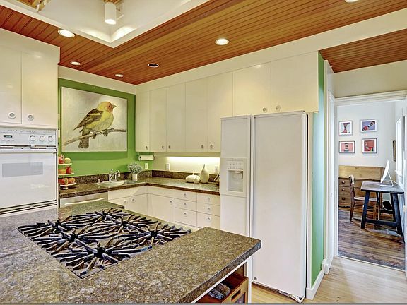 kitchen island with 6 burner Wolf gas 
cooktop