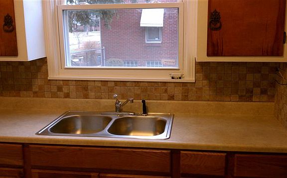 Kitchen, new lower cabinets, sink, counter, floor!