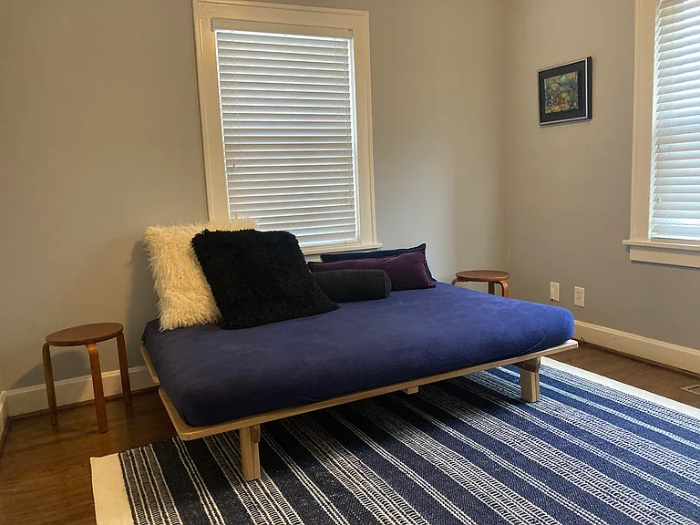 Second bedroom for guests; memory-foam mattress topper available.