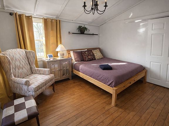 Lower-level bedroom offering comfort and added privacy.
